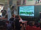 Giving a presentation on reforestation for a third grade class