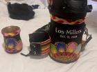 A custom themo and guampa decorated with traditional Paraguayan embroidery called Nanduti