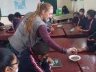 Visiting students at a local school