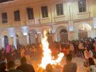 The city's residents gather to burn "monigotes" as the clock strikes midnight at New Year's