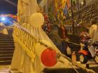 A wedding scene of "monigotes" on one of the main flights of steps in the city