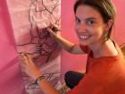 I'm painting a mural at my health post which demonstrates the intervals at which people need to bring their babies to the health post for vaccinations. It's a fun project! 