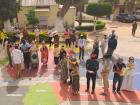 All us volunteers were blindfolded and led to stand on a giant map in our thus far undisclosed villages. Here I am (flowery-dress, bottom middle) about to have my life changed forever! 