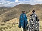 Two other Peace Corps volunteers wearing traditional Basotho blankets, called kobos 
