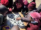 Some of my students playing chess, a popular game at my school