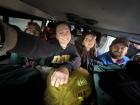 Squished tight in a taxi to the capital