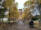 The King's House with yellow leaves on the path leading up to it