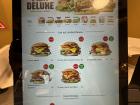 Here is a MAX Burger menu, featuring nacho burgers.