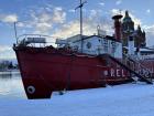 Boat in Helsinki stuck on an ice lake