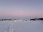 Snowy lake with the sunset