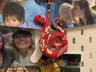 I have a board in my bedroom decorated with pictures of loved ones that I brought with me. I added a snake decoration for the Lunar New Year! I hope it brings me good luck