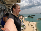 Right before I fell off of the bungee jumping platform, I was really scared. But here I am taking a deep breath and laughing it off to get my courage up!