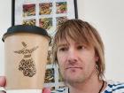 The cafe's coffee cups feature the signature "Whirling Dervish" logo of the Sufi Islamic tradition