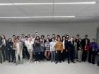 A group photo of ENS Rennes students after a wine and cheese event