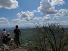 My friends perch on the cliff of Kablar Mountain