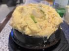 Gyeran-jjim, an egg custard dish steamed in a hot stone bowl
