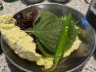 Korean chili pepper, lettuce leaves and perilla leaves are used to make "ssam", or wraps