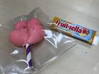 A macaron from school lunch and a candy from a student