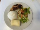 A corrientazo meal! This was pork with rice, salad and a side of yuca (root vegetable popular in South America).