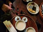 Sweet rice drink and rice cakes for a snack in a traditional teahouse