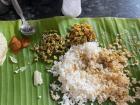 In Kerala, it is normal to eat on banana leaves, which are super-abundant and avoid the need for silverware