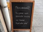 A witty sign from one of my favorite cafes. I challenge you to translate it!
