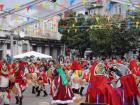 Hundreds of people in traditional costumes, including kids!