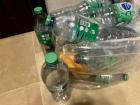 I go through these cases of water so quickly, but I reuse the bottles to water my plants.