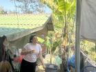 My roommate cooking us some carrots in the morning. Many Lao kitchens are actually outdoors.
