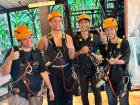 Here's me and my friends after zip lining through the pouring rain. We were very cold but very happy!