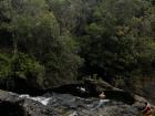 Swimming in the rock pools at Jawili Falls