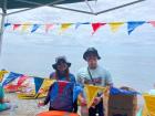 My coworkers organizing the Bancaton, or boat race!