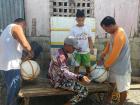 Fishermen prepare buoys to demarcate a marine protected area