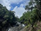 Large rock pool at the bottom of Jawili Falls