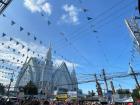 Crowds of people gathering at a church in Cebu for the Sinulog Festival
