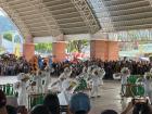 Elementary students perform a traditional folk-style performance for an Antique fiesta