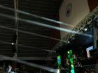 A DJ performs for community members at an Antique festival