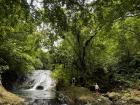 Cooling off in mountain streams beneath beautiful waterfalls