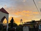 Watching the sunset behind a nearby Catholic church