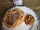 Here's my favorite Nepali breakfast! It's sel roti (a sweet fried dough) with milk tea and achar (spiced and pickled vegetables) on the side. I dip the roti into the tea or the achar