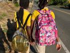Cami and her friend walking to school