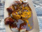Currywurst is a great, quick lunch. It is a sliced sausage covered with a warm curry ketchup sauce