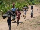 Malawians carrying water/food to their homes