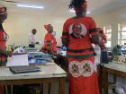 When the teacher's go to the statehouse for government events they where the women wear the proper dress including the face of the current President 
