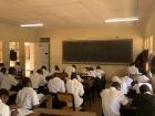 Form 1 students writing a chemistry exam