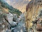 The Colca River, which created the canyon by carving away at the rock of the mountains for millions of years