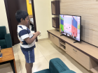 Adhvik watching his favorite TV show
