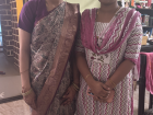 My neighbor helped me wear a traditional saree for the upanayanam
