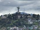 View of Quito's iconic statue from the Basilica in the historical center.