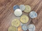 Dollar coins are popular here. Ecuador has its own 25 and 5 cent coins.